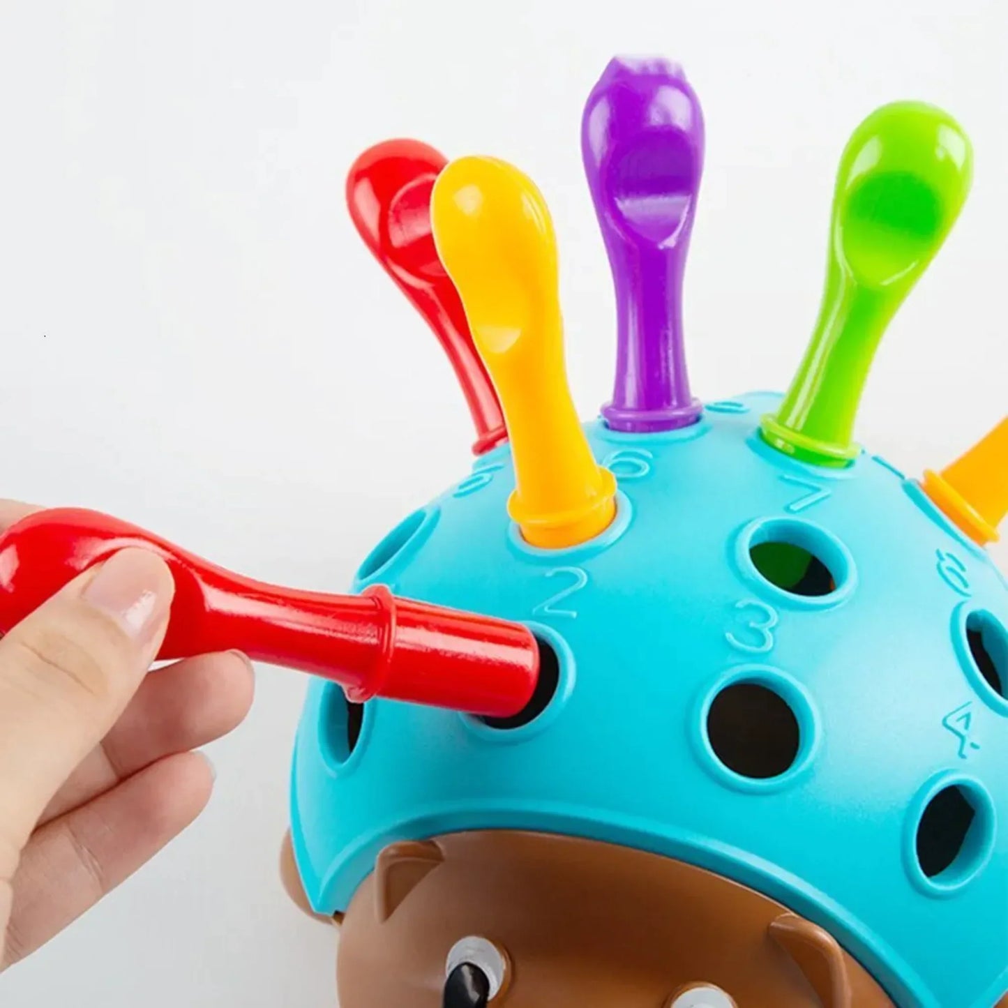 Jouet interactif en forme de hérisson